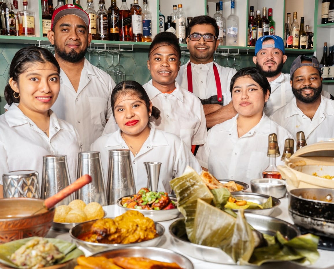 Staff at a restaurant owned by Unapologetic Foods.